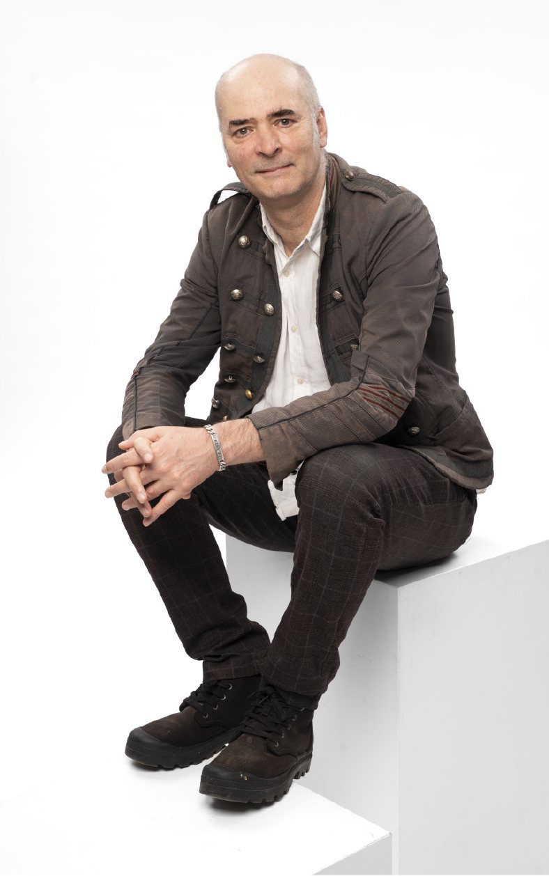 Sébastien Petiot, assis, souriant